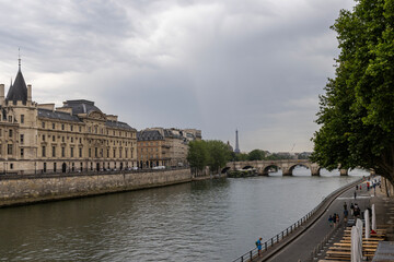 Fototapeta premium Paris, bridge over the Seine river, historical architecture on the streets of the city. Paris, France