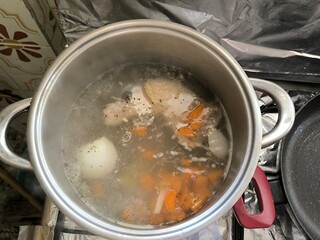 cooking soup in a pot