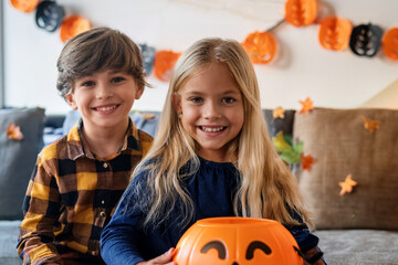 children playing with pumpkins