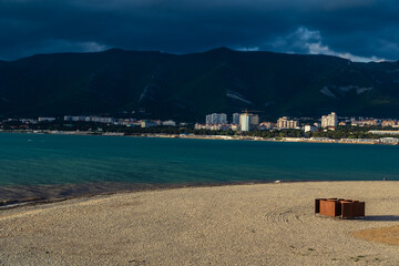 Obraz premium Gelendzhik resort. Sunset. Changing cabin on shore of Gelendzhik Bay.
