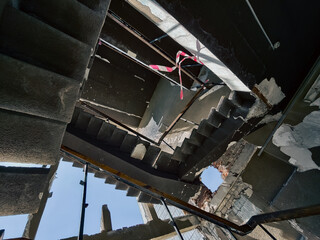 inside a building burned down and destroyed during the war in a city in Ukraine