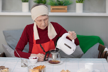 Elderly woman preparing fruit salad at home in the living room