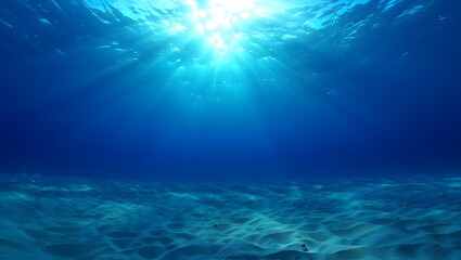 Fototapeta premium Underwater Sunlight Streaming Through Rippling Water Surface Creating Calm Serene Scene