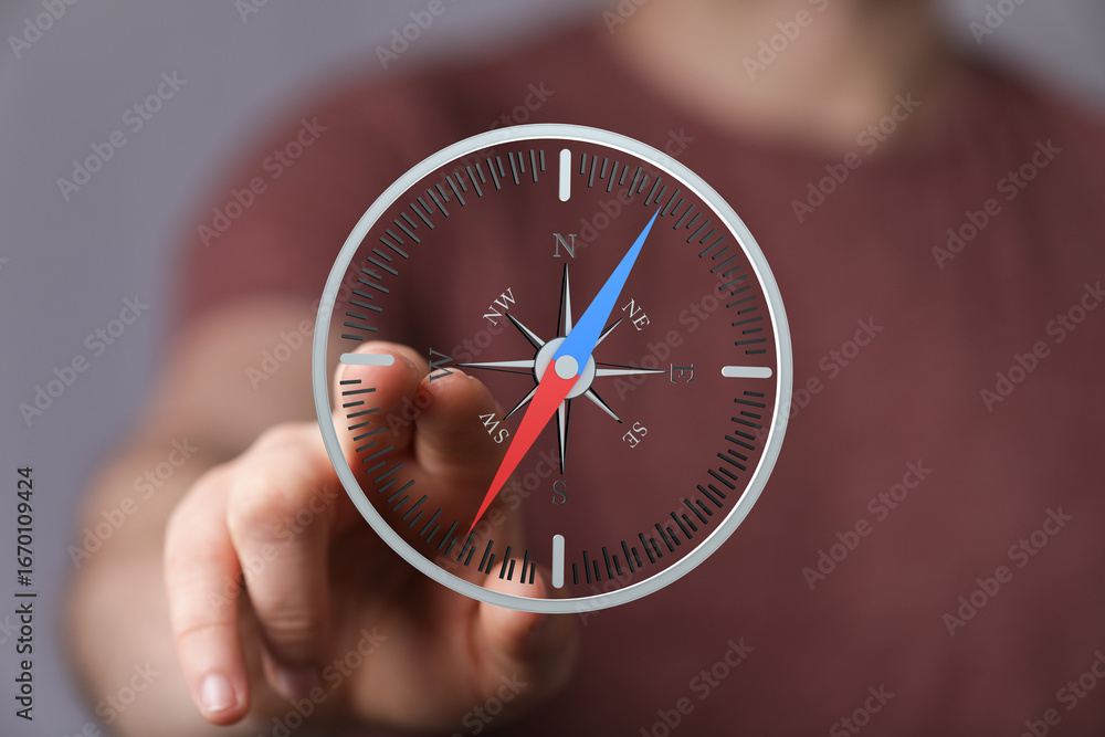 Poster person using a digital compass app for navigation. find your direction.