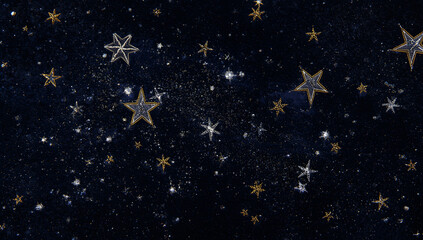 Gold and silver embroidered stars on dark blue velvet fabric
