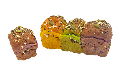 wholemeal bread resh buns with different seeds on white background. 