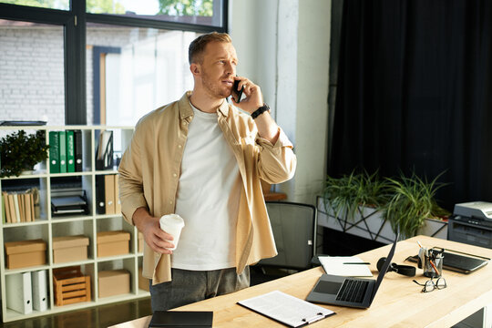 Confident young businessman engaged in a productive conversation during office hours