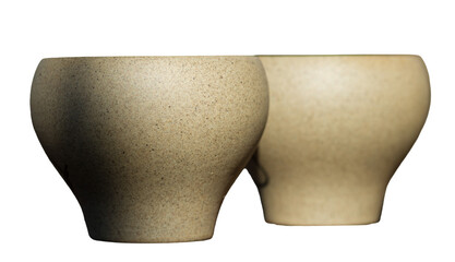 Chinese tea ceremony. Ceramic teapot made of clay and bowls on a wooden background.