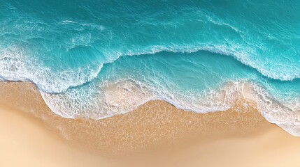 Serene Beach Scene: Aerial view of a pristine beach where turquoise ocean waves gently roll onto the shore. This photo captures the raw beauty of nature, creating a sense of peace and relaxation.