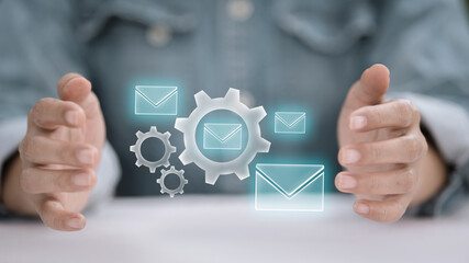 Email Marketing Automation with Digital Gears and Businessman Hands