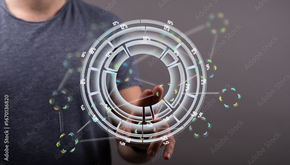 Aufkleber stock photo of a person interacting with a holographic circular data interface, showing percentages 