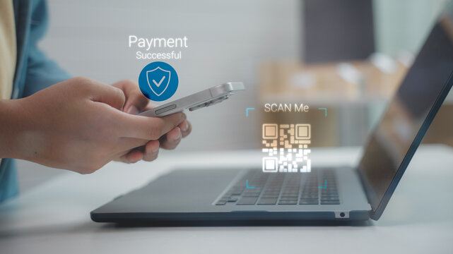 Close up of hand using smartphone scanning QR code with payment successful. Concept of secure digital transaction, fintech, mobile banking, e-commerce and online financial technology. - Powered by Adobe