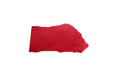 Trozo de papel rojo rasgado con bordes irregulares sobre fondo transparente