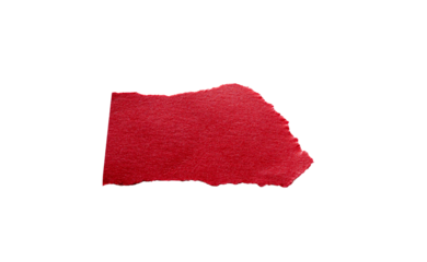 Trozo de papel rojo rasgado con bordes irregulares sobre fondo transparente