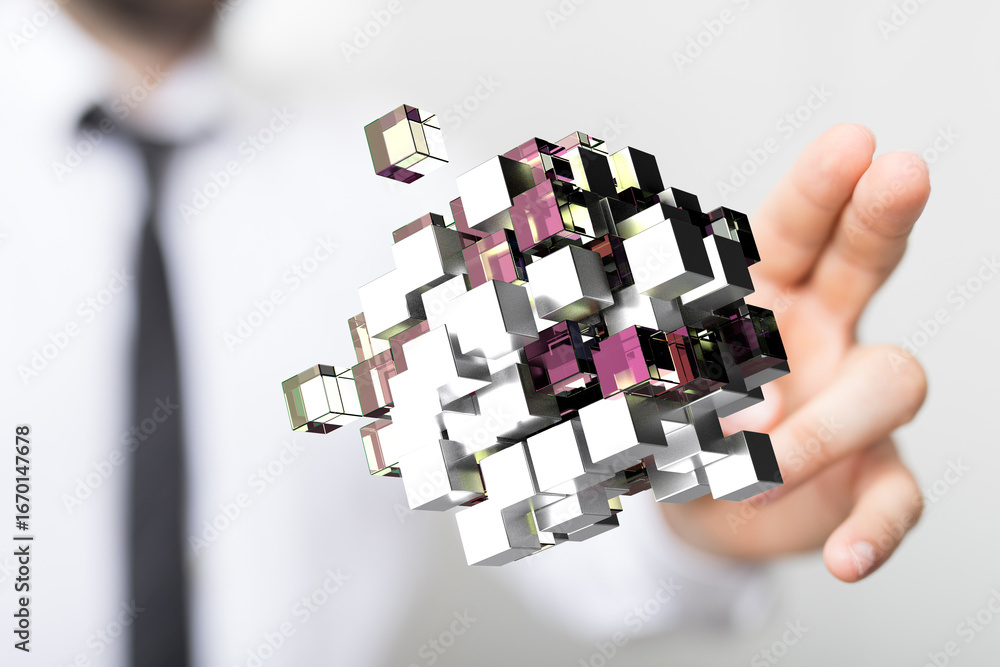 Poster abstract image of a businessman holding a network of interconnected cubes, symbolizing data, technol