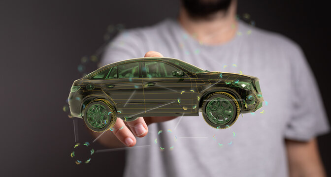 Person presenting a digital car model, showcasing automotive technology and innovation.