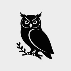 Fototapeta premium Owl Silhouette on Branch in Black and White Design
