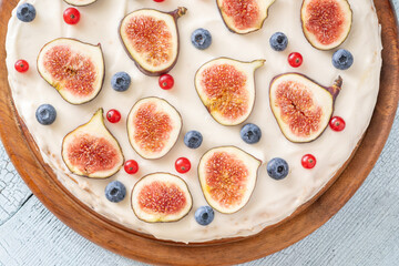 Whole cream cheese berry layer cake topped figs currant blueberries