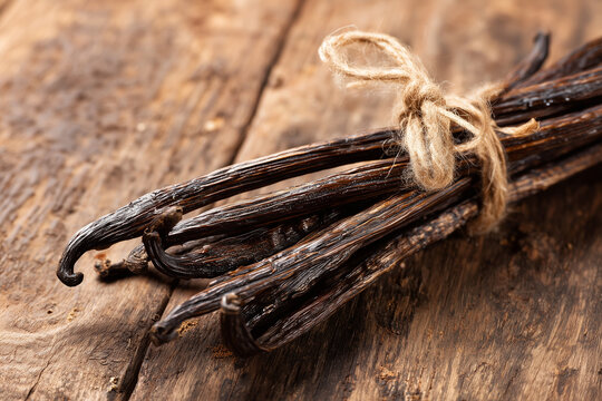 Dried vanilla beans for baking and cooking. Vanilla pods tied with natural string