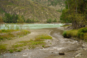 View of autumn nature and river with mountains