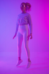 Woman in vibrant neon lighting