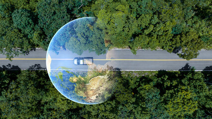 Aerial top view road in forest with car motion. Winding road through the forest. Car drive on the...