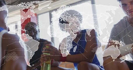 Basketball team sitting on bench reacting to transparent world map overlay fading grabbing water - Powered by Adobe