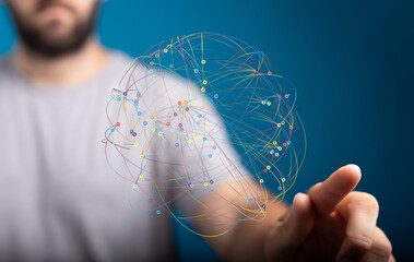 Man interacts with a digital network sphere, showcasing global connectivity and data flow.