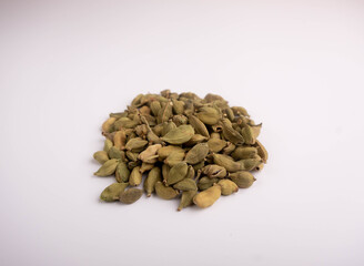  dried cardamom on a white background