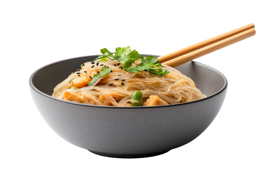 Delicious noodles served in a grey bowl with chopsticks and garnished with herbs, perfect for an Asian cuisine theme.