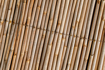 High-resolution image of a natural bamboo mat, perfect for backgrounds and textures.  Ideal for websites, design projects, and more.