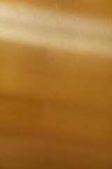 High-resolution image of a golden brown textured background, perfect for websites or design projects. Download now!