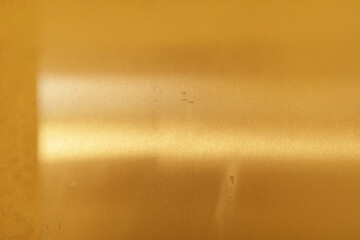 High-resolution image of a brushed gold metal texture. Perfect for backgrounds, design projects,...
