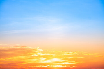 Beautiful , luxury soft gradient orange gold clouds and sunlight on the blue sky perfect for the background, take in evening,Twilight, Large size, high definition landscape photo