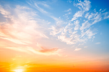 Beautiful , luxury soft gradient orange gold clouds and sunlight on the blue sky perfect for the background, take in evening,Twilight, Large size, high definition landscape photo