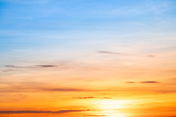 Beautiful , luxury soft gradient orange gold clouds and sunlight on the blue sky perfect for the background, take in evening,Twilight, Large size, high definition landscape photo