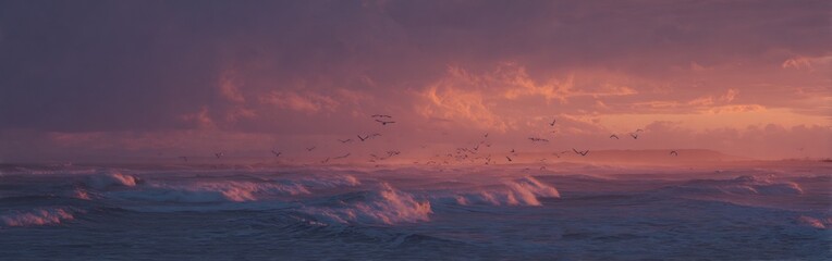 Dramatic coastal scenery showcasing a mesmerizing sunset with dynamic waves and soaring birds