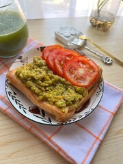 Avocado toast with tomatoes