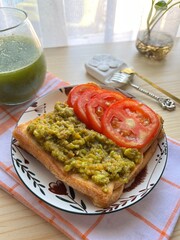 Avocado toast with tomatoes