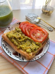 Avocado toast with tomatoes