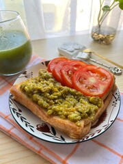 Avocado toast with tomatoes