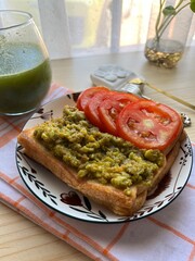 Avocado toast with tomatoes