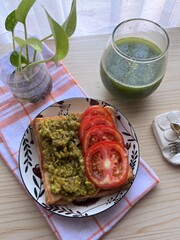 Avocado toast with tomatoes