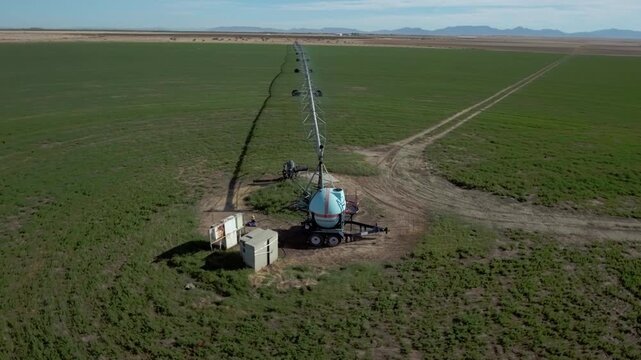 Yuma Arizona USA &ndash; 4K Drone Aerial of Irrigation and Circular Crop Fields with Tractors