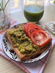 Avocado toast with tomatoes