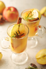 Warm apple autumn drink with cinnamon