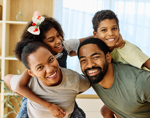 Portrait of a black family having fun at home