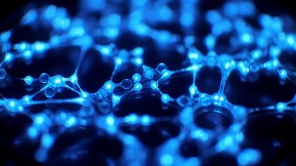 Glowing blue spheres connected by thin strands against a dark, blurred backdrop - Powered by Adobe