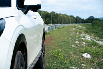 Car journey along scenic roadside countryside photograph green landscape side view adventure travel