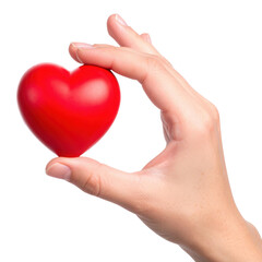 Fototapeta premium A hand gently holding a small red heart between thumb and index finger.